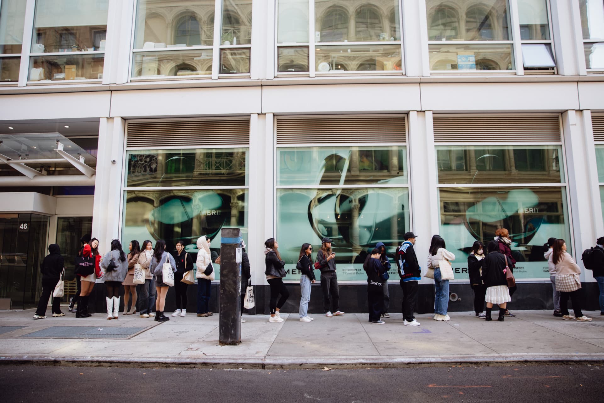 Long queue of attendees lining the sidewalk outside the Biodance pop-up in SoHo