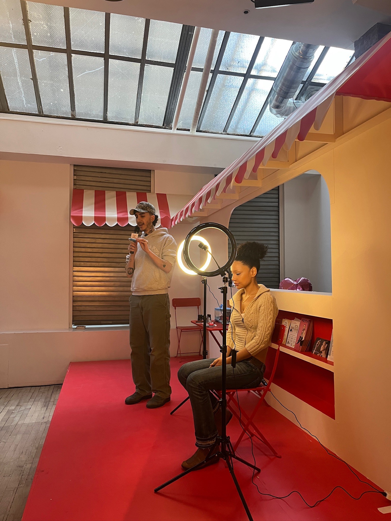 Attendees watching the live makeup session inside the Beauty Bakery pop-up